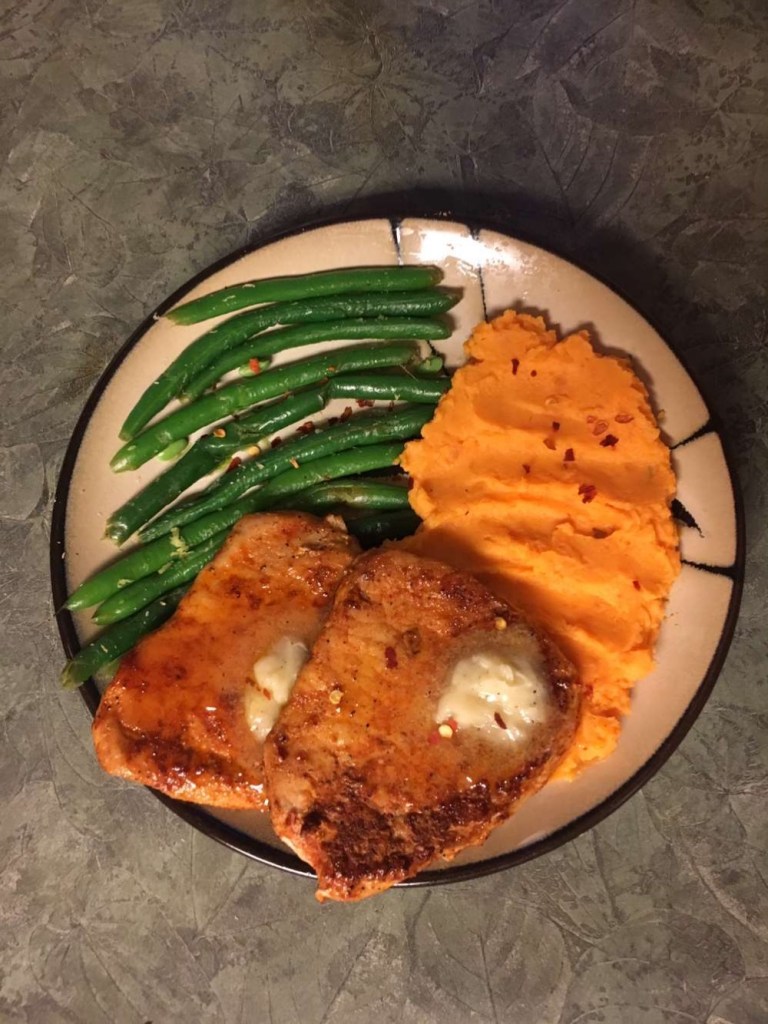 A “Home” Cooked Meal
	 For this week on “picky eater tries unique foods”, we decided to make our attempt at home cooked meals. I am not the best chef by any means necessary. My idea of cooking is through food in the microwave and calling it good. Our original plan for the evening was to go out to Panera and find something gross to order. However, after having just gotten back from a weekend vacation at Disneyland where all I ate was processed food, I decided to let my friend give it a try and attempt to make me like her food. That and the Panera was closed by the time we got there. 
	It started by me making a very specific list of food items, textures, and flavors I didn’t like. I also showed her my food blog for an idea of what I had previously been doing. Then she said “I have the perfect idea but it’s going to have to be a surprise”. This made me slightly upset because she knows I don’t like surprises, especially when it comes to food but I really needed to step out of my comfort zone tonight. Upon the arrival at her house, I could smell what seemed like orange zest and garlic. This was already a major concern of mine because while I love garlic, orange flavored things make me feel sick and I don’t want to associate something nasty with something I love. After about an hour of cooking, my friend had finally completed her dish for me. What I saw before my eyes was both so aesthetic yet made my stomach want to run for the hills at the same time. Green beans, mashed yams, and tofu. While the Tofu looked amazing, all I could smell was the orange overpowering everything else on the plate. 
	“Don’t get offended if I don’t like it,” I reminded my friend because after all, it was her cooking but it was also an experiment. I decided to start with the tofu and save the worst for last. I like tofu, but only when it's nearly burnt to a crisp. On its own or with very little cooking and marinating, tofu has one of the worst textures I’ve ever come across. Something about it is just so unsettling. “Look I made it look just like meat!” my friend exclaimed. She was very proud of the dish. I was able to slide my fork right through the slab of tofu and that’s how you know it’s undercooked. After giving it a thorough taste, let’s just say my reaction was nowhere near what I was really feeling inside. I acted like it wasn’t that bad but in reality all I wanted to do was spit it out and run 10,000 miles away. Maybe that’s a little dramatic but the texture was very slimy, the mandarin sauce was far over powering, and the giant slabs of butter on top did not help whatsoever. To cleanse my palate, I decided to move on to the yams which I was only scared about because of the seasoning my friend said she had put in them. Her family only liked spicy stuff so when she said it had a bit of a kick to it, I was very nervous. However; after trying it, I was pleasantly surprised. The sweet flavor of the yams went really well with the spices that I hadn’t even heard of before but weren’t too spicy for my weak palette. Last was the green beans, which after the tofu didn’t seem so bad. I’ve tried to like green beans for so many years but it’s never quite worked out. Something about the celery like texture and crunchiness just leaves me on a bad note. After trying my friend’s version, I wasn’t ready to say I had changed my mind about green beans but I also wasn’t opposed to eating all the ones that were on my plate. While the texture still wasn’t great, it was overall a lot softer than any other green beans I’ve had in the past. When the rare occasion occurs that I do eat vegetables, I like them almost overcooked and very soft and these green beans almost mimic that. Plus overall the garlic flavor of the beans was a home run in my book.
	Now for the ratings...this is the part that gets complicated for me because each component of the dish almost deserves its own rating but I’m going to grade the dish as a whole. As far as the flavor goes, I’d give it a 6/10. If it were just the tofu alone it’d be a zero but the mashed yams and green beans really saved this dish. For how full it makes me, I’d say that if I had actually liked the tofu, I definitely would have been stuffed afterwards but even just with the yams and green beans I wasn’t full but I was satisfied. Texture gets a whopping 2/10 because of the tofu and green beans. In the previous editions of this blog, it has really been focused on gross tastes and I think my friend used that against me to make the perfect disaster that she did. Would I “order” it again? Probably not. Next time I’ll leave the cooking up to me. For an overall rating out of 10 I’m giving the dish a 5 because the presentation was very beautiful and I can’t completely knock it down just because I’m the super picky one. Any normal person would have probably loved this dish. Thank you Natalie for being my Mom away from home and making me a home cooked meal.
